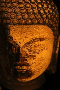 Translucent yellow-dyed Buddha head #1