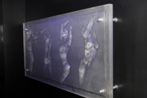 Femme Fatale resin relief mounted with metal stand-offs as wall art