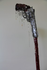 Revolver on a stilt supported by & dripping resin formed as stalagmites